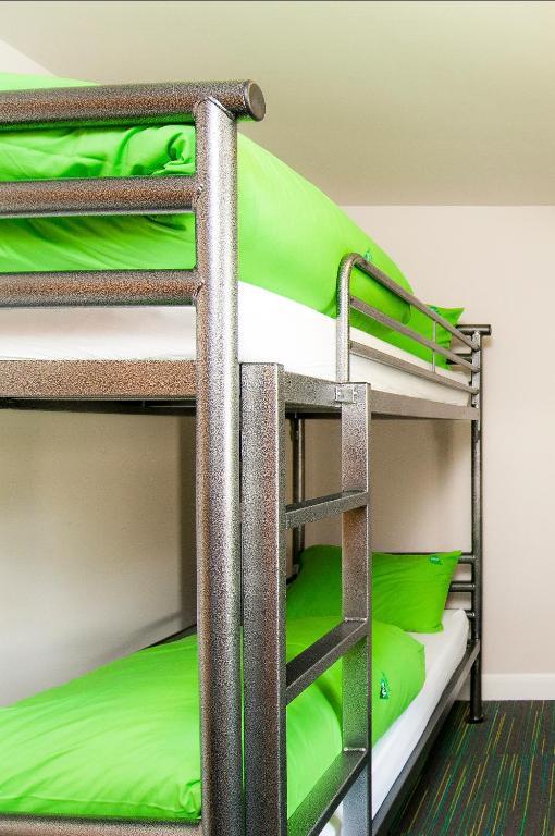 Letto a Castello in Dormitorio Maschile con Bagno in Comune